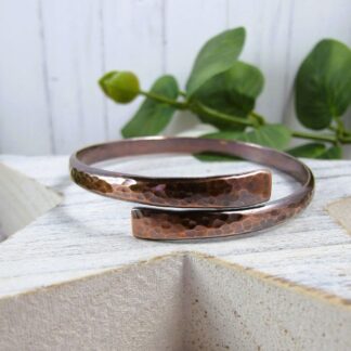 copper bangle overlap style hammered finish