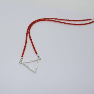 Carnelian beaded necklace with silver triangle pendant