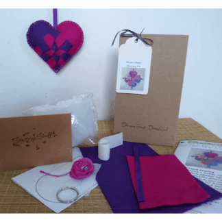 The woven heart keyring craft kit and the contents of the box