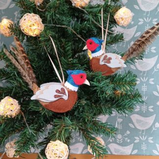 Two Ring-necked Pheasant felt Christmas tree hanging decorations by lyndawilcansew on a tree with fairy lights