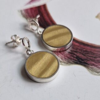 Handmade sterling silver round cufflinks, inlayed with polymer clay, in shades of pale banana gold with a satin finish