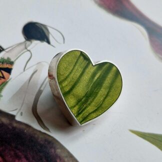 Handmade sterling silver heart brooch, inlayed with polymer clay, in shades of whitegrape golden green with a satin finish