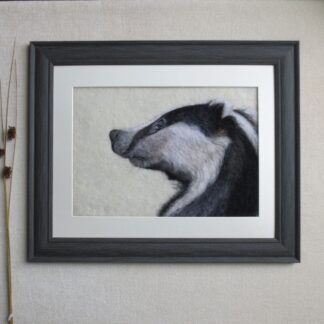 Side profile portrait of a badger.