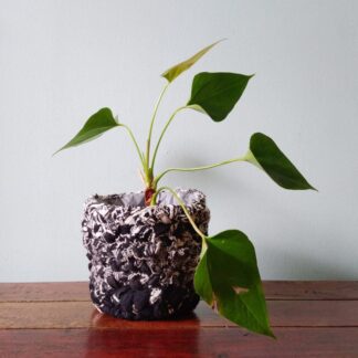 planter made from black and white recycled fabric scraps