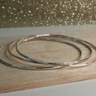 set of three hammered silver bangles