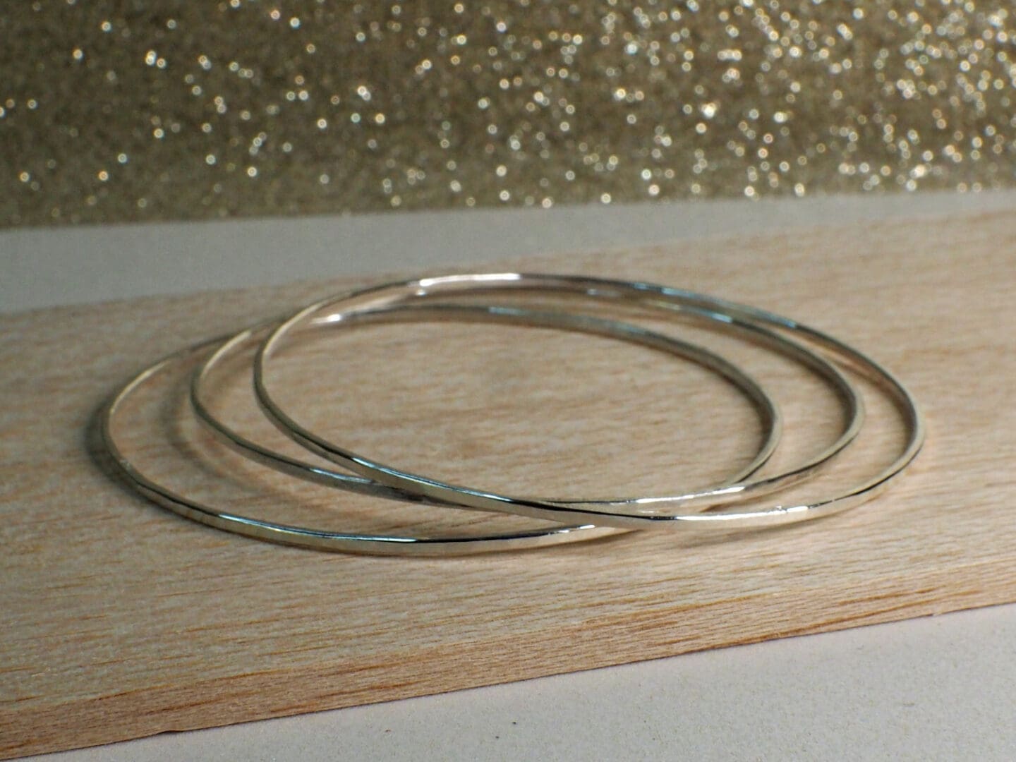 set of three hammered silver bangles