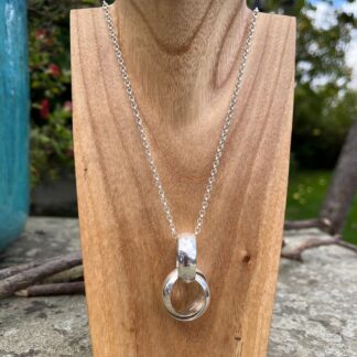 Sterling silver chunky interlocking pendant necklace with 3 hoops on a long chain