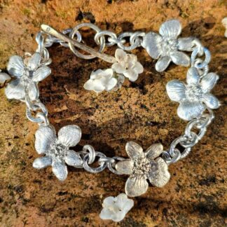9ct gold and sterling silver geranium flower bracelet, outside flower shot, Isobel Kelly Jewellery