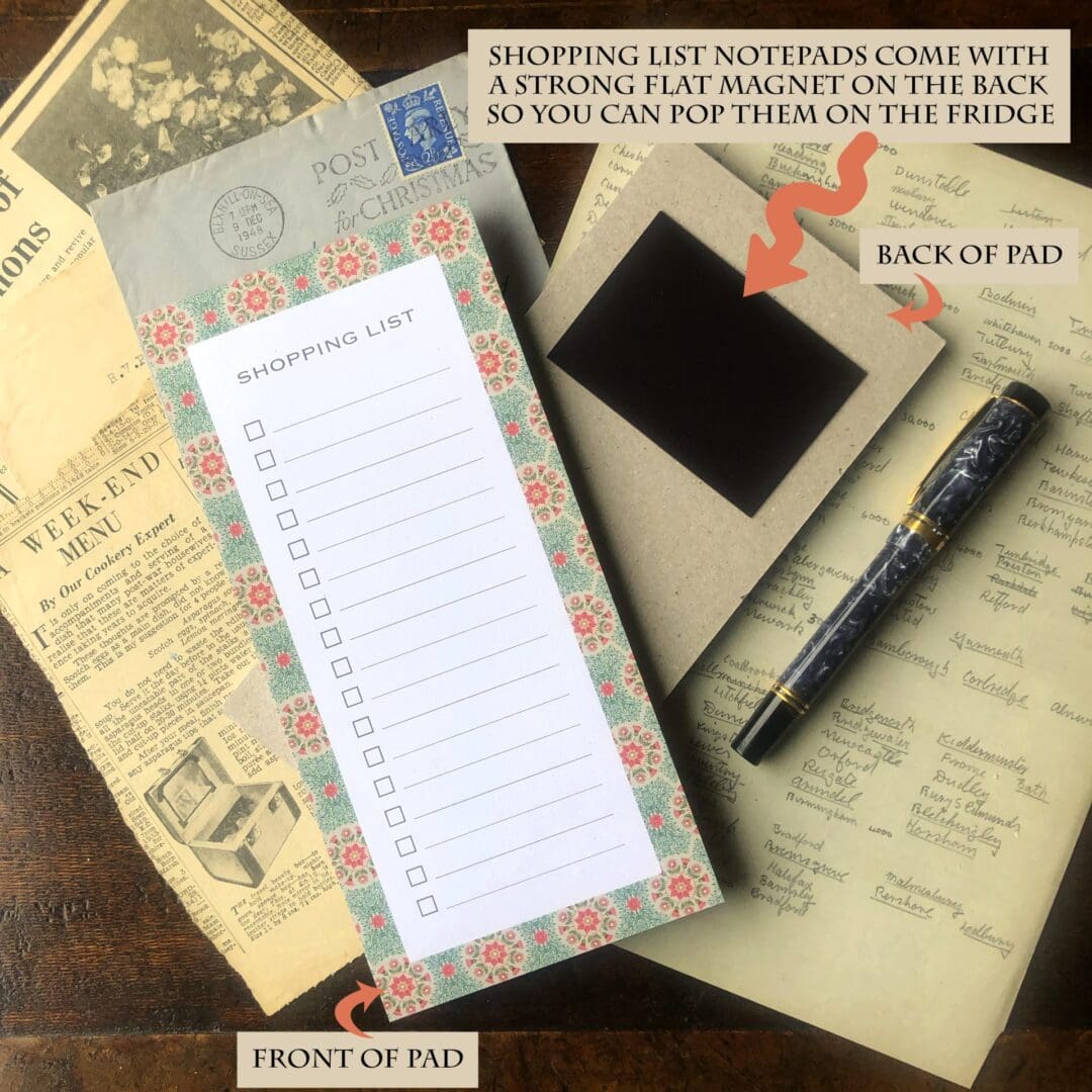 A floral daisy magnetic shopping list notepad showing the front design and flat magnet on the back, styled with vintage letters and a fountain pen.
