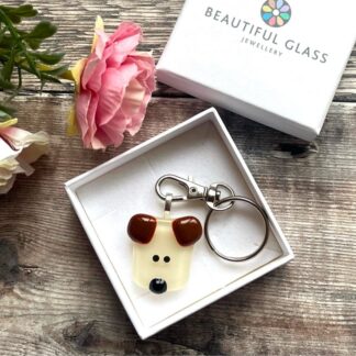 Handmade fused glass dog keyring. This puppy has a cream face, brown ears and a small black nose
