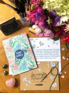 Handwritten message inside an illustrated greeting card, showing the artist’s personal touch.
