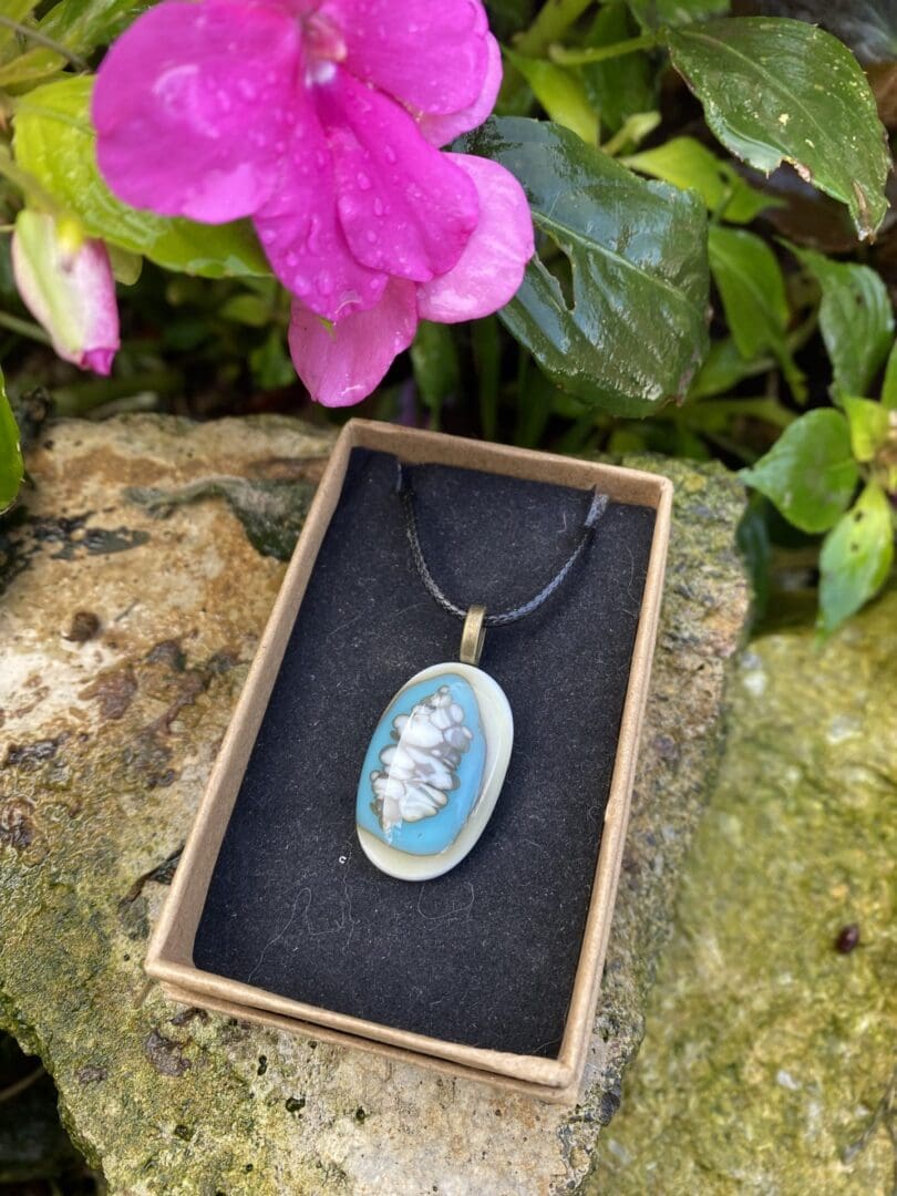Blue and Cream fused glass pendant