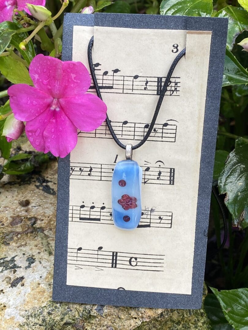 Copper and fused glass flower pendant