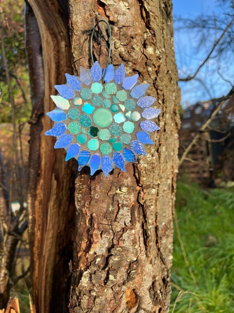 Artisan Mosaic Flower - slate-backed garden hanging, gift for design-led outdoor spaces.