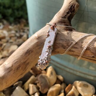 Sand cast textured recycled silver barnacle necklace with copper bail and balls