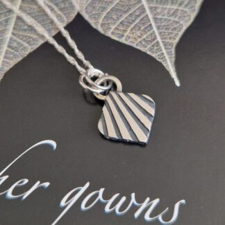 Handmade oxidised sterling silver necklace embossed with Art Deco Style sun ray pattern