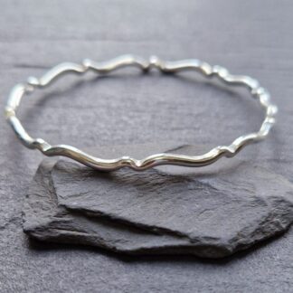 sterling silver rolling wave bangle handmade hallmarked
