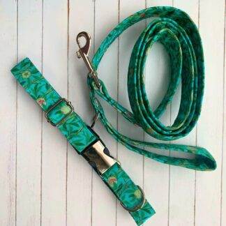 Flat lay photo of dog collar and lead in navy William Morris Bird And Pomegranate design