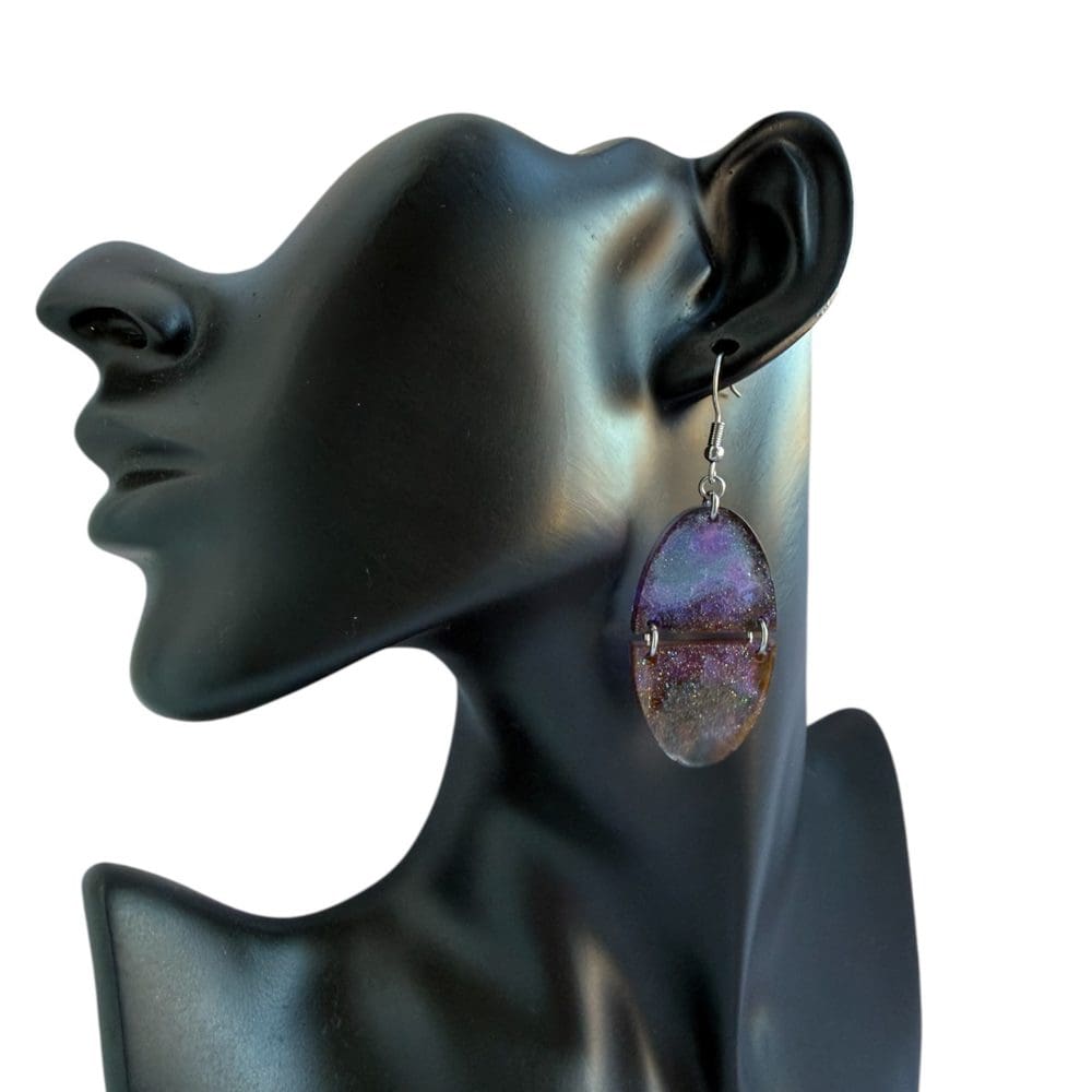 Glittery winter night sky earrings with Santa in flight and subtle holographic shimmer