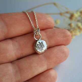 Sterling silver dandelion pebble necklace, handmade by The Tiny Tree Frog Jewellery
