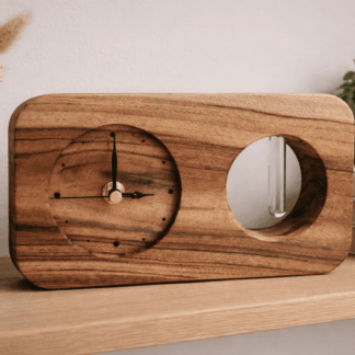 Handcrafted camphor wood mantle clock with integrated glass bud vase