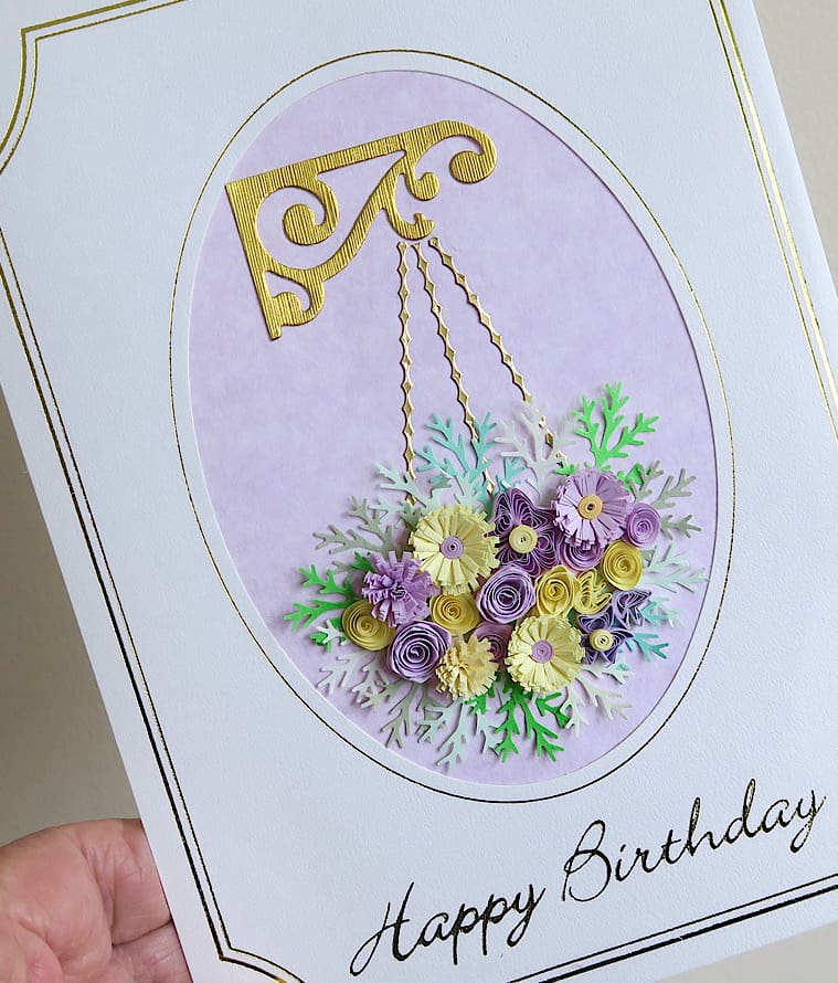 Handmade birthday card with quilled flower hanging basket