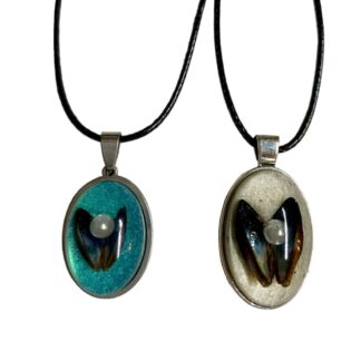 Mussel shell pendants from Shetland.