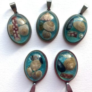 Sea blue shell pendants from Shetland.