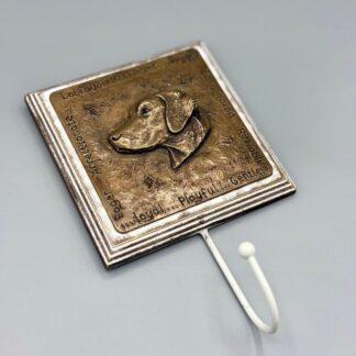 Dog lead hook featuring a square metallic plaque showing the sculpted head of a Labrador in relief and the words describing the breed characteristics inscribed around the edge. The single hook is mounted below the plaque. A choice of Copper, pewter and bronze finishes are available.