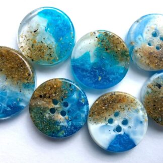 Beach sand buttons from The tv series Shetland.
