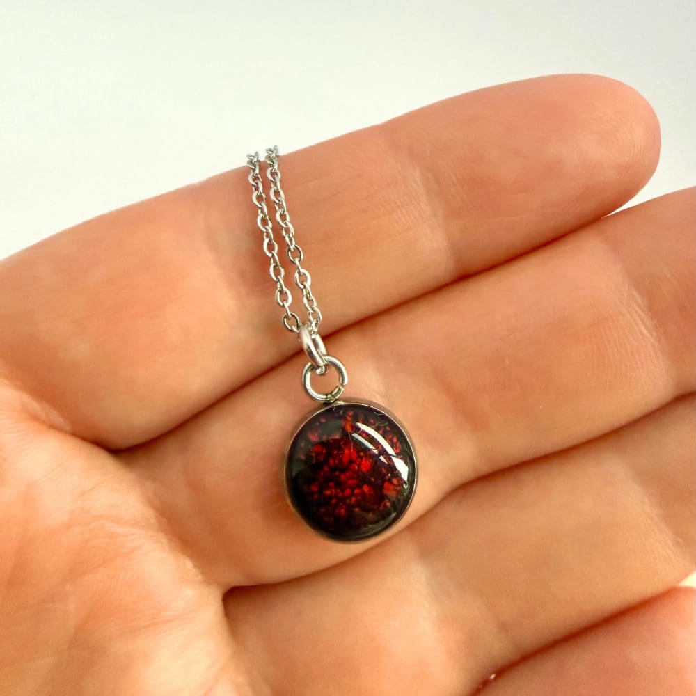 10 mm cabuchon necklace on hand to show size