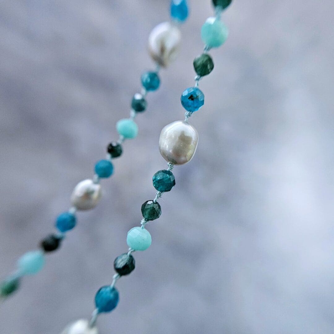 Grey baroque pearl, blue tourmaline, apatite and amazonite, hanging bead detail, Isobel Kelly Jewellery