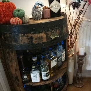 home bar made from a whisky barrel