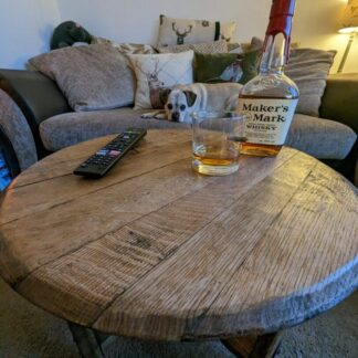 round rustic oak coffee table made from a whisky barrel