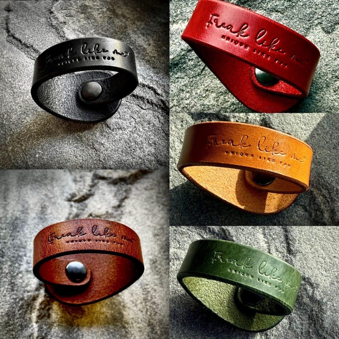 The backside of a Freak Like Me leather bracelet in five colours - black, brown, mustard, red and green