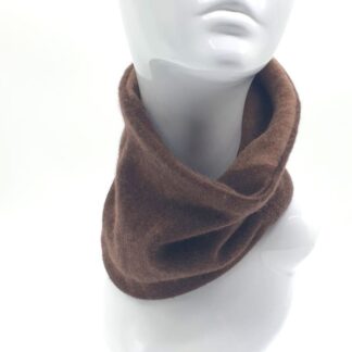 Model wearing cashmere neck warmer in shdes of brown