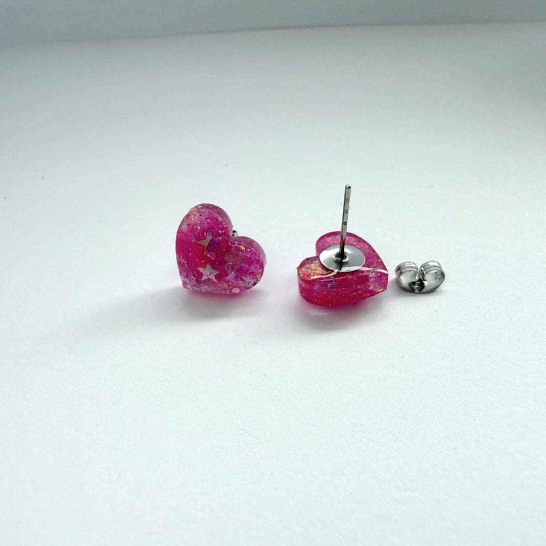 Handmade pink glitter heart resin stud earrings