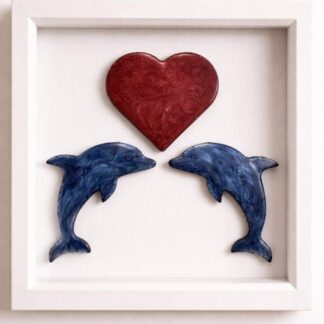 Handcrafted resin wall art of two seahorses beneath a red heart in a matt white box frame.