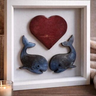 Handmade resin whale artwork beneath a red heart in a white framed box.