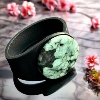 Large Round Green Emerald Gemstone on a black natural chunky leather bracelet
