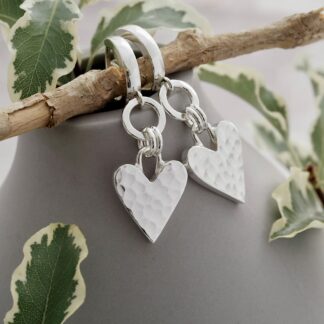 Handmade sterling silver hammered heart and circle dangle earrings supplied on lever back hoop huggie style ear fittings