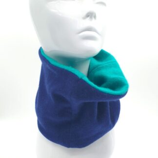 Model wearing jade and navy neck warmer