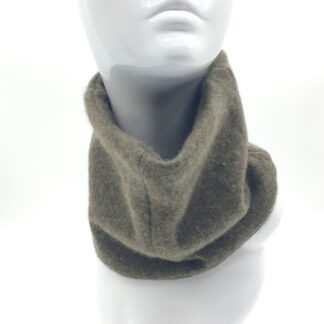 Model wearing moss green neck warmer