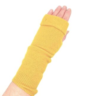 Mustard yellow fingerless gloves on a hand