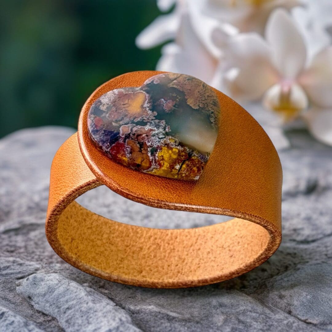 Unique Natural Leather Bracelet in Mustard colour with a Natural heart-shaped Scenic Moss Agate Gemstone centrepiece. Made by Freak Like Me in Bristol