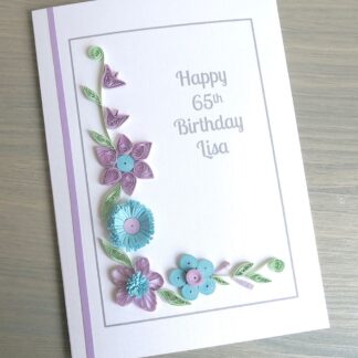 Handmade 65th birthday card with personalised message and lilac and blue quilled flowers