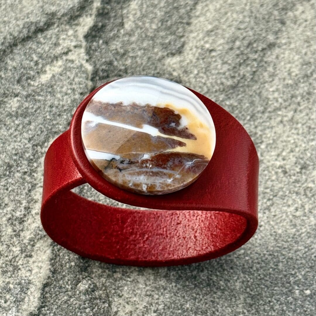 Real Red leather bracelet with a Sunset design Moss Agate in Jasper centrepiece front view
