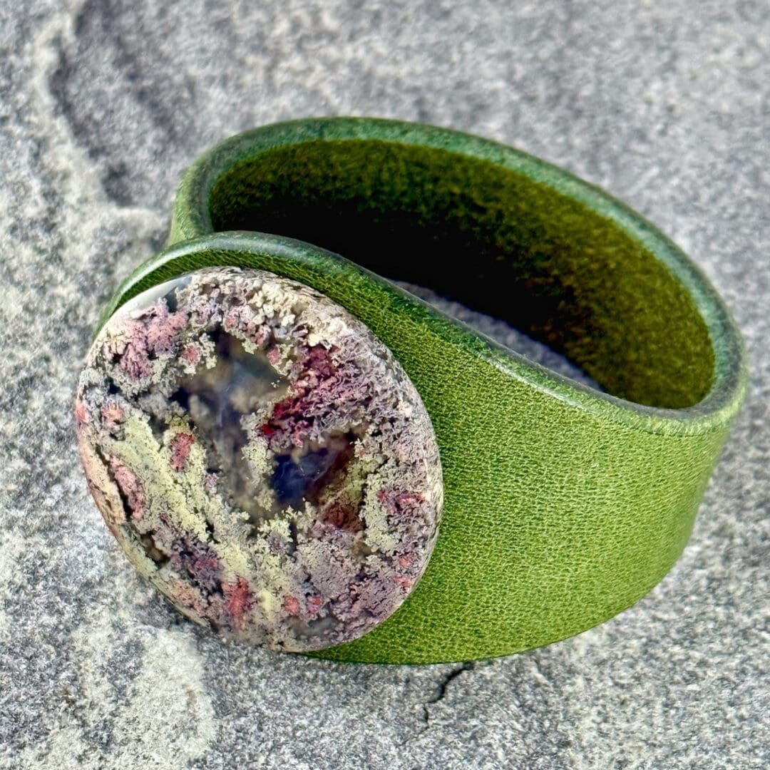 Scenic Moss Agate leather bracelet handcrafted by Freak Like Me in Bristol - featuring a natural moss-patterned green gemstone set into premium leather with nickel-free snap fastening.
