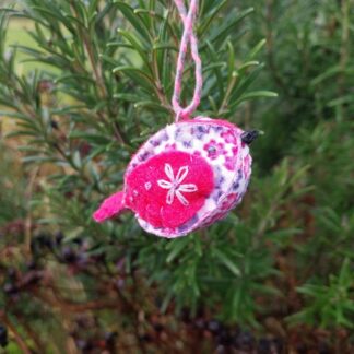 a-handmade-felt-and-fabric-bird-decoration-in-a-pink-and-purple-colourway