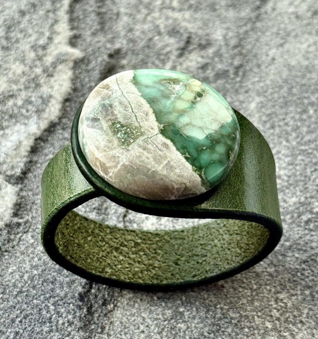 Scenic Moss Agate leather bracelet handcrafted by Freak Like Me in Bristol - featuring a natural moss-patterned green gemstone set into premium leather with nickel-free snap fastening.